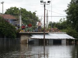 Las inundaciones junto con las torrenciales lluvias dejaron este fin de semana como resultado cuatro muertos. AP / J. Saenz