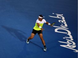 Nadal estrena el año con una victoria ante su compatriota Ferrer. AFP / K. Sahib