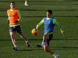 James se entrenó con normalidad este sábado y debería formar parte de la nómina ante el Valencia. EFE / J. Martín