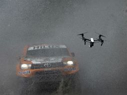 Helicópteros de seguridad no podían despegar y partes de ruta estaban inundadas. AFP / F. Fife