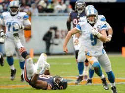 El quaterback de los felinos, Matthew Stafford, número nueve; pasó para 298 yardas y tres touchdowns. AFP / D. Banks