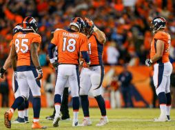 Los Broncos aseguraron la cima de la Americana pese a que se enfilan a la postemporada con un dilema de quarterback por resolver. AFP / J. Edmonds