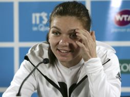 La lesión de Simona Halep deja a Azarenka con otra rival. AP / T. Pickard