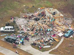 Especialistas se resisten a considerar los tornados consecuencia de la variación del clima a nivel mundial. AP /