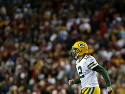 Green Bay remontó una desventaja de 0-11 tras el primer cuarto con par de pases anotadores de Aaron Rodgers. AFP / R. Carr