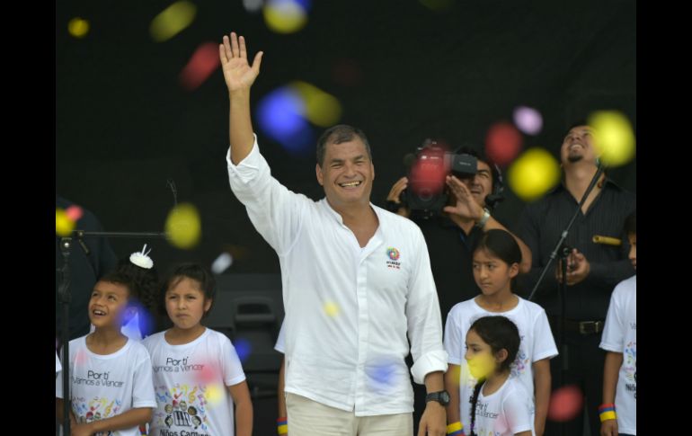 Correa asegura que regresó la esperanza, el orgullo y el autoestima a los ecuatorianos. AFP / R. Buendia