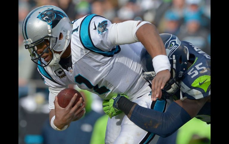 Cam Newton lanzó un pase de touchdown. AFP / G. Halverson