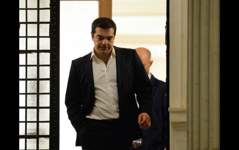 A un día de que su cumpla un año de la llegada al poder de Alexis Tsipras, la agencia cambia la calificación del país. AFP / ARCHIVO