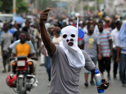 Las manifestaciones son 'un golpe de Estado electoral', se alega que están arregladas para que gane Jovenel Moise, oficialista. AFP / H. Retamal