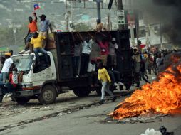 Durante el jueves y viernes se registraron manifestaciones y varios puestos de votación fueron incendiados en Puerto Príncipe. AFP / ARCHIVO