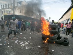 La oposición reclama la renuncia del presidente Michel Martelly y la instauración del gobierno provicional que celebre nuevos comicios. EFE / ARCHIVO