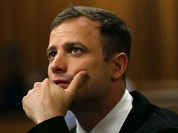 Pistorius está bajo arresto domiciliario mientras la corte constitucional decide si considera su apelación. AFP / ARCHIVO