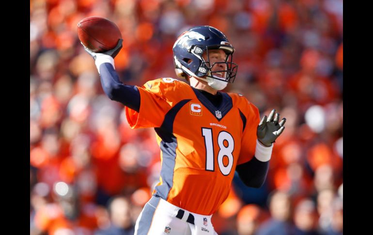 Peyton Manning dejará el jersey naranja para meor ocasión y jugará de blanco en el Super Bowl. AFP / E.Shaw