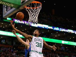 Marcus Smart se destacó con Boston al aportar 16 puntos. AFP / M. Meyer