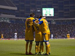 Tigres festeja su victoria tras el partido. MEXSPORT / J. Ramírez