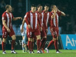 Los jugadores del Sevilla festejan su pase a la final del torneo. AFP / C. Manso