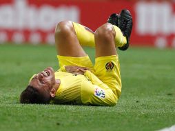 Jonathan dos Santos se queja de una falta durante el partido de este día ante el Málaga. AFP / J.Jordan