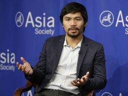 Reclaman que Pacquiao esté en un cargo nacional y no sea un legislador 'para todos'. AP / ARCHIVO