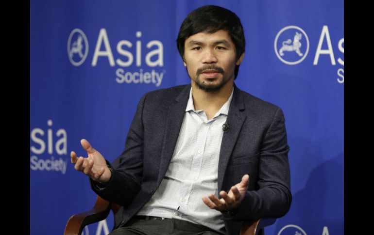 Reclaman que Pacquiao esté en un cargo nacional y no sea un legislador 'para todos'. AP / ARCHIVO