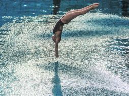 Centro acuático María Lenk. Dolores Hernández ejecuta uno de sus clavados durante la Final del trampolín de tres metros. AFP / Y. Chiba