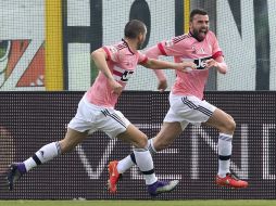 Andrea Barzagli abrió el marcador al minuto 24. AP / P. Magni