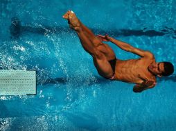 Rommel Pacheco, campeón del mundo, competirá en la prueba individual de trampolín de tres metros. AFP / ARCHIVO