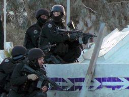 Un escuadrón en posición, durante el enfrentamiento en Ben Guerdan. AFP / F. Nasri