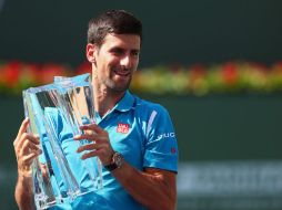 El tenista serbio ganó su tercer Masters 1000 consecutivo y superó a Roger Federer, con quien estaba igualado a cuatro títulos. AFP / J. Finney