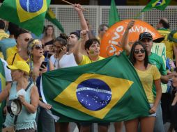 Unas 150 personas se concentran frente a la residencia de Lula. AFP / N. Almeida