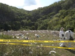 Agregan que se realizarán más pruebas para confirmar científicamente si es posible quemar 43 cuerpos en el basurero de Cocula. EFE / ARCHIVO