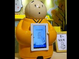 El templo Longquan desarrolló el robot a fin de promover al budismo entre la juventud china que conoce de tecnología. ESPECIAL /