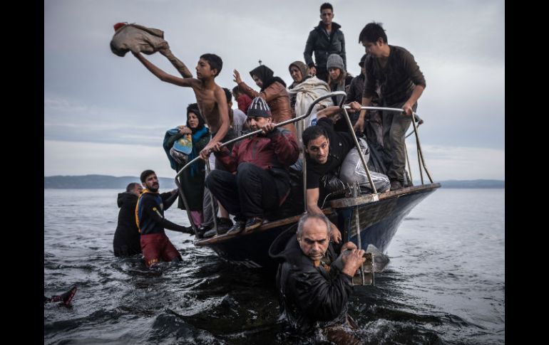 Es galardonado junto a sus colegas Sergey Ponomarev, Tyler Hicks y Daniel Etter del New York Times. AP / S. Ponomarev