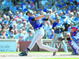 Nolan Arenado encabeza el apartado de carreras impulsadas, además de conseguir nueve hits y cuatro jonrones. AFP / D. Buell