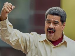 'Tres años por el pecho oligarquía, y los que faltan', indicó Maduro al retar los opositores. AFP / J. Barreto