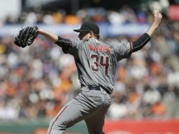 Tyler Wagner permitió dos hits en cinco episodios como relevo de Shelby Miller. AP / M. J. Sánchez