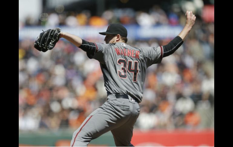 Tyler Wagner permitió dos hits en cinco episodios como relevo de Shelby Miller. AP / M. J. Sánchez