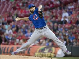 Jake Arrieta. El abridor de los Cachorros concedió cuatro pasaportes, ponchó a seis y sólo permitió seis elevados. AP / J. Minchillo