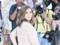 Discreta. A pesar de la fama, Elizabeth Olsen ha procurado mantener los pies en la tierra. AP /