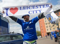 Los fanáticos del Leicester City también celebran su primer título de la liga inglesa. AFP / J. Tallis