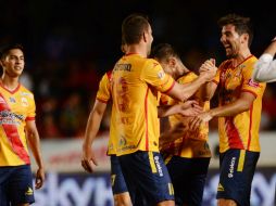 Jugadores de Morelia celebran su triunfo ante Veracruz. MEXSPORT / L. Monroy