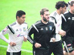 Listos para la primera guerra civil. Hugo Ayala, André-Pierre Gignac, Nahuel Guzmán y Enrique Palos, en la práctica. MEXSPORT /