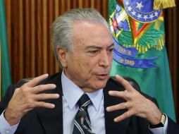 Temer afirma que con la ayuda de todos quiere encarrilar al país. AP / E. Peres