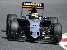 ''Espero seamos fuertes en la carrera, tenemos una buena posición en la pista'', dice Sergio. AFP / T. Gandolfini