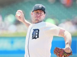 Jordan Zimmermann se fue en el sexto episodio lesionado, pero no sin antes llevarse la victoria tras cinco entradas y dos tercios. AP /