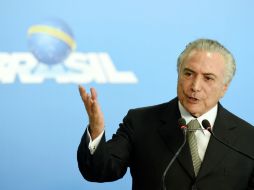 Temer advierte que si no se toman medidas urgentes se estaría sentenciado a futuras generaciones a penurias extraordinarias. AFP / E. Sa