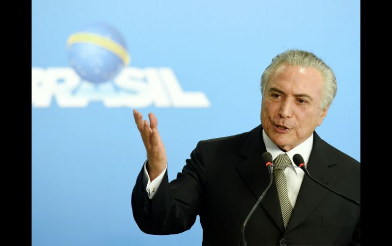 Temer advierte que si no se toman medidas urgentes se estaría sentenciado a futuras generaciones a penurias extraordinarias. AFP / E. Sa