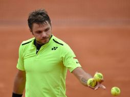 Stanislas Wawrinka enfrentará a Albert Ramos por el pase a las semifinales. AFP / P. López