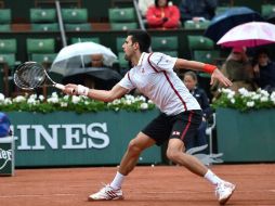 El número uno había perdido el primer set por 6-3, el primero que pierde en lo que va del abierto francés. AFP / E. Feferberg