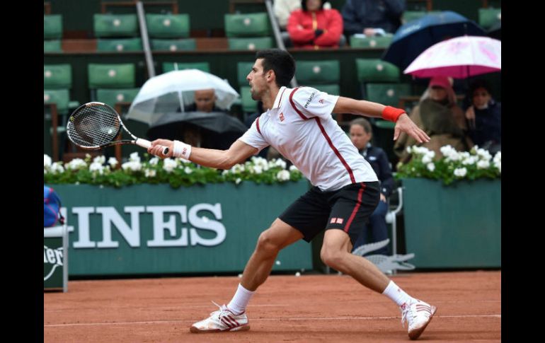 El número uno había perdido el primer set por 6-3, el primero que pierde en lo que va del abierto francés. AFP / E. Feferberg