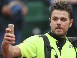 El suizo Stan Wawrinka, defensor del título, acaba este miércoles  con el sueño del español Albert Ramos. AP / D. Vincent